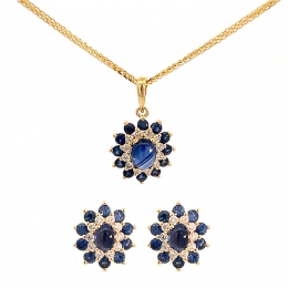 Oval Sapphire Pendant Set in Gold and Diamonds